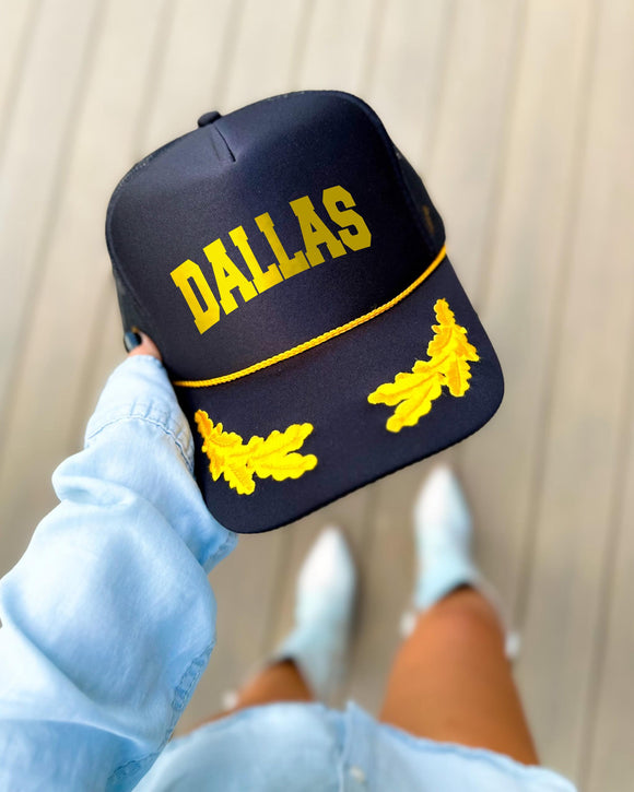 Dallas Texas black trucker hat with gold varsity lettering, gold rope and gold oak leaves on the visor